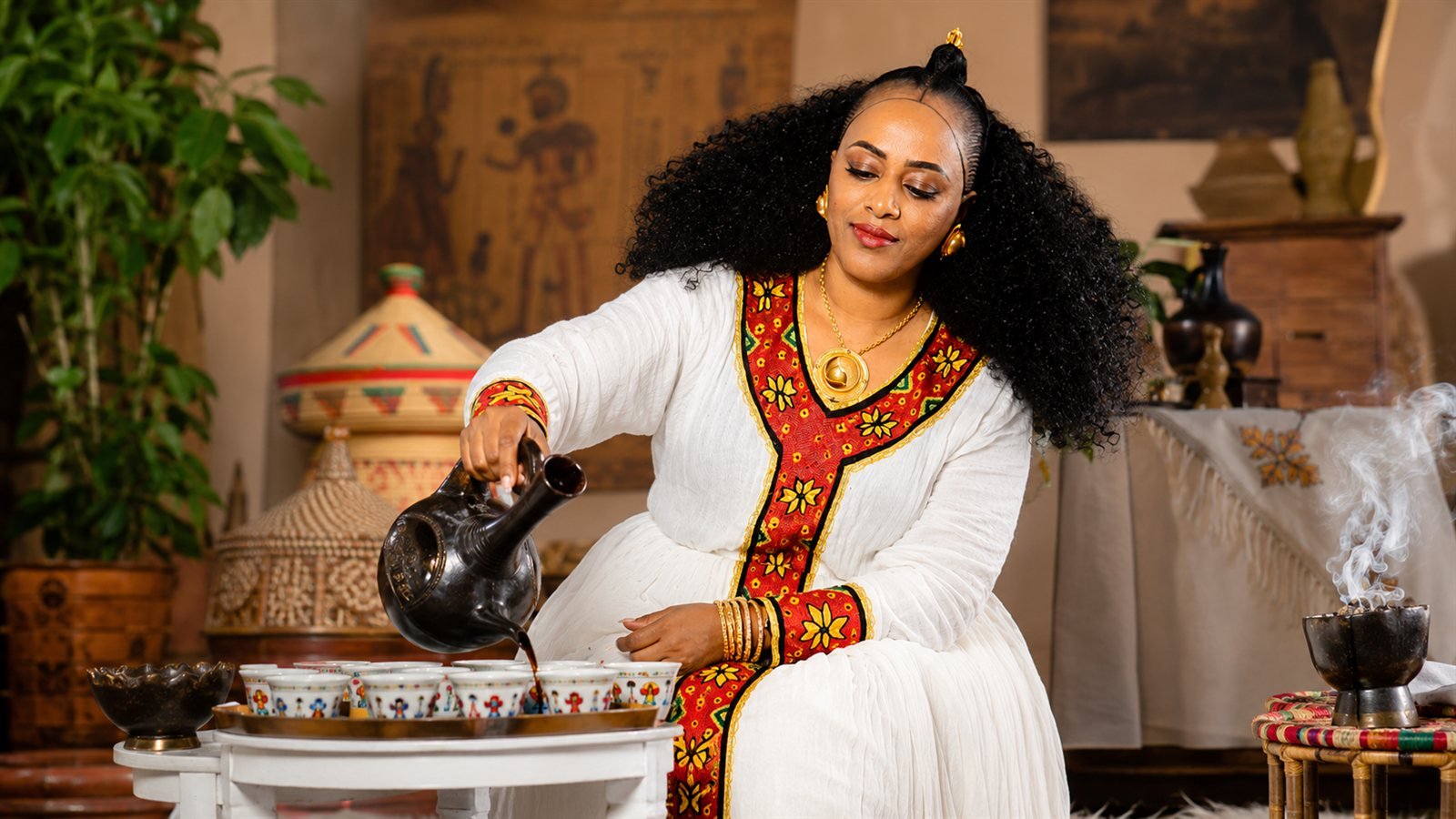 Traditional coffee ceremony pour at Asmara Bella