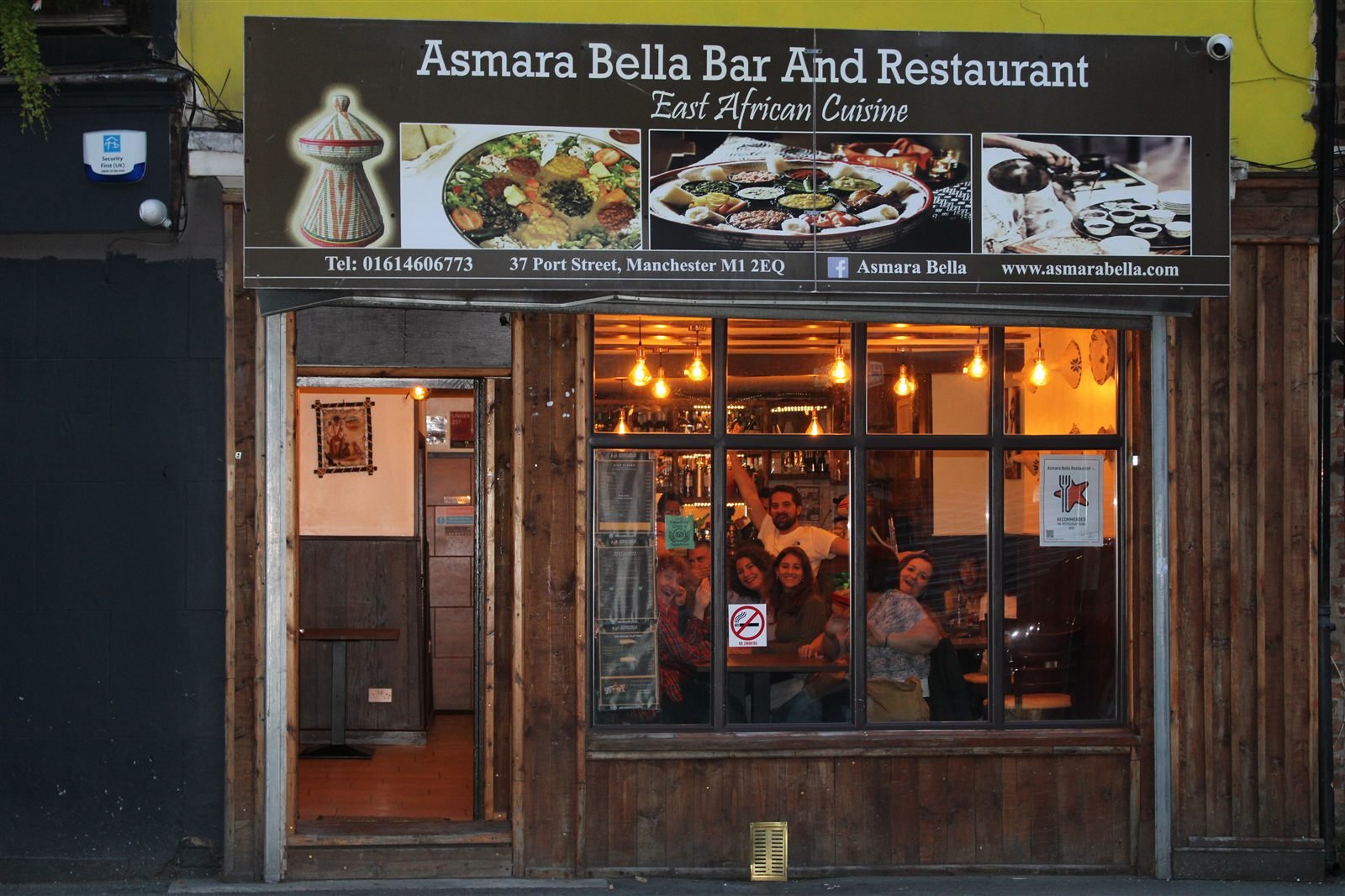 Asmara Bella storefront at night